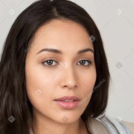 Neutral white young-adult female with long  brown hair and brown eyes