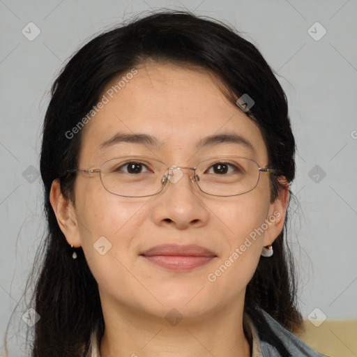 Joyful white adult female with medium  brown hair and brown eyes