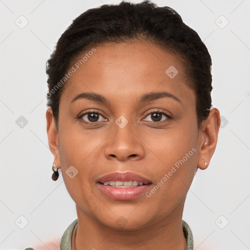 Joyful latino young-adult female with short  brown hair and brown eyes