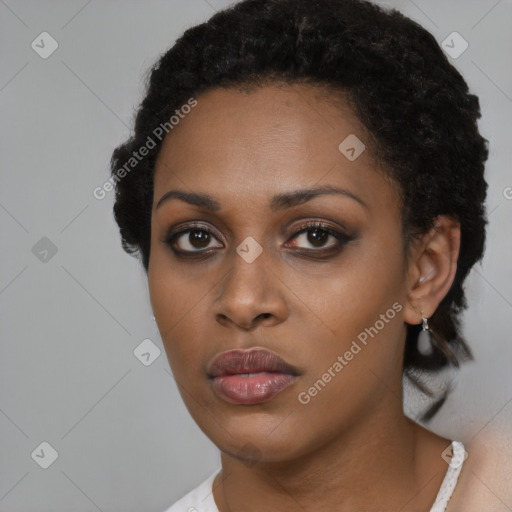 Neutral black young-adult female with short  black hair and brown eyes