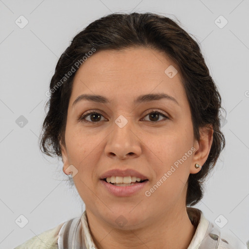 Joyful white adult female with medium  brown hair and brown eyes