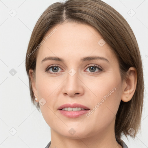 Joyful white young-adult female with medium  brown hair and grey eyes