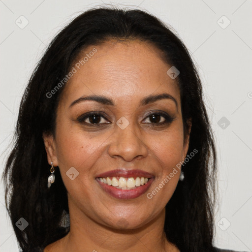 Joyful latino young-adult female with long  brown hair and brown eyes