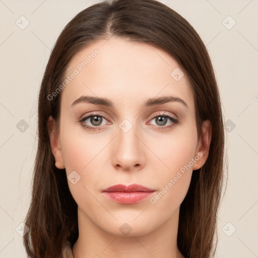 Neutral white young-adult female with long  brown hair and green eyes