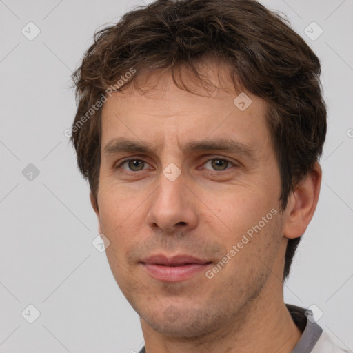 Neutral white adult male with short  brown hair and brown eyes