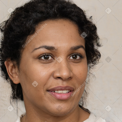 Joyful latino adult female with medium  brown hair and brown eyes