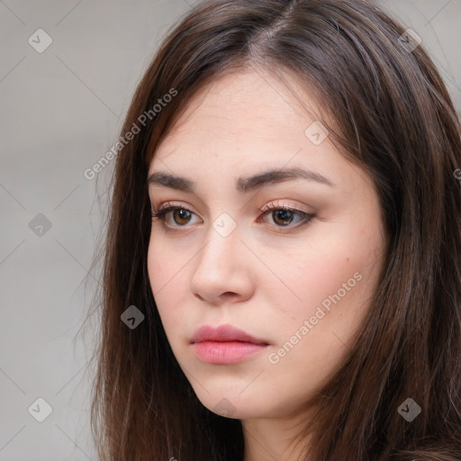 Neutral white young-adult female with long  brown hair and brown eyes