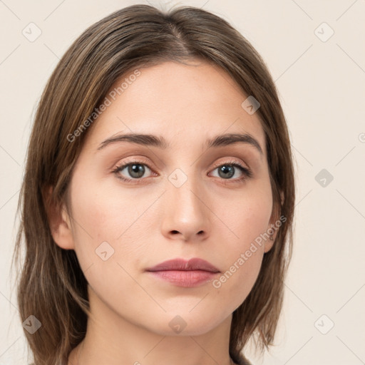 Neutral white young-adult female with medium  brown hair and grey eyes