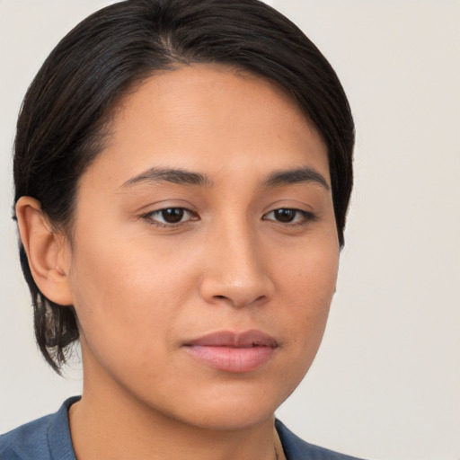 Neutral white young-adult female with medium  brown hair and brown eyes