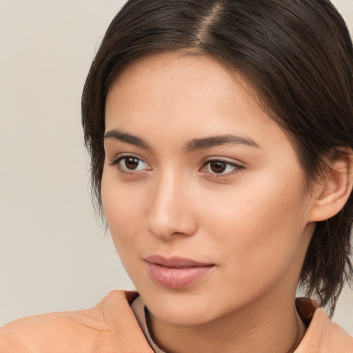 Neutral white young-adult female with medium  brown hair and brown eyes