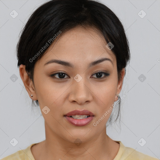 Joyful asian young-adult female with medium  brown hair and brown eyes