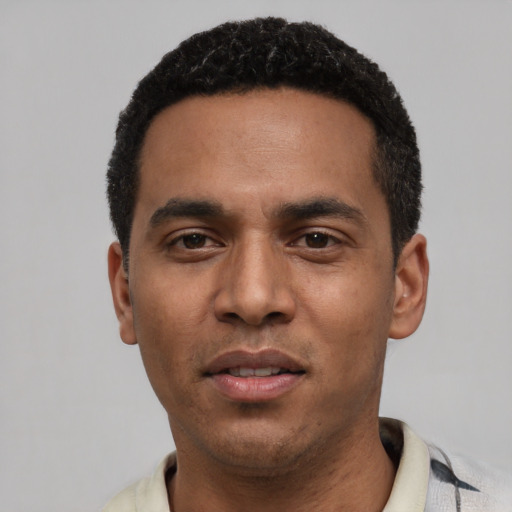 Neutral black young-adult male with short  black hair and brown eyes
