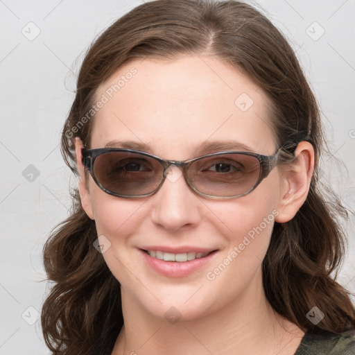 Joyful white young-adult female with medium  brown hair and blue eyes