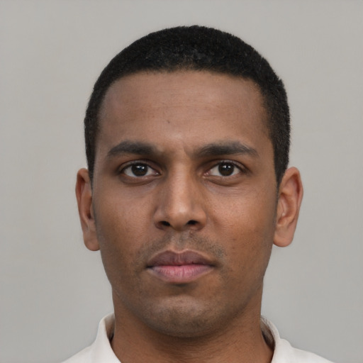 Neutral black young-adult male with short  black hair and brown eyes