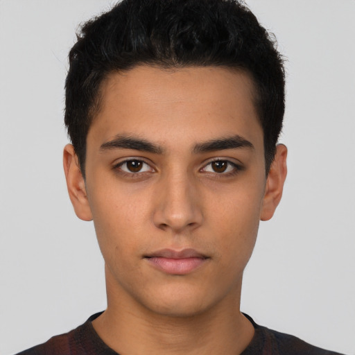 Neutral latino young-adult male with short  brown hair and brown eyes