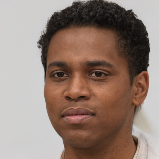 Neutral black young-adult male with short  brown hair and brown eyes