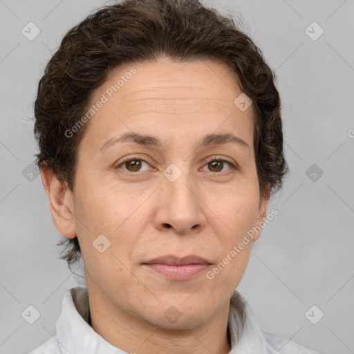 Joyful white adult female with short  brown hair and brown eyes