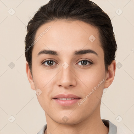 Joyful white young-adult female with short  brown hair and brown eyes