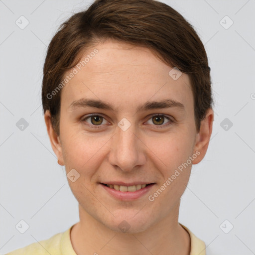 Joyful white young-adult female with short  brown hair and grey eyes