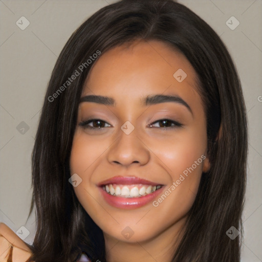 Joyful latino young-adult female with long  black hair and brown eyes