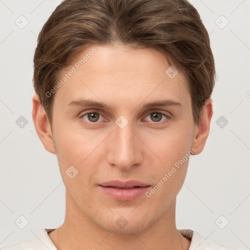 Joyful white young-adult male with short  brown hair and brown eyes