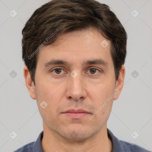 Neutral white adult male with short  brown hair and brown eyes