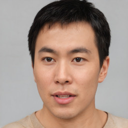 Neutral asian young-adult male with short  black hair and brown eyes