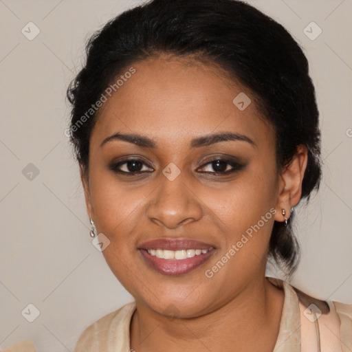 Joyful black young-adult female with medium  brown hair and brown eyes