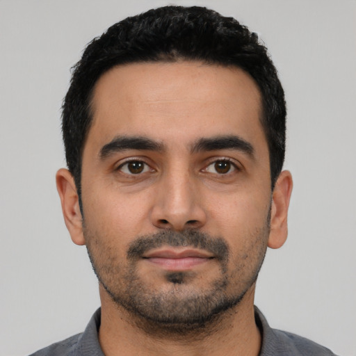 Neutral latino young-adult male with short  black hair and brown eyes