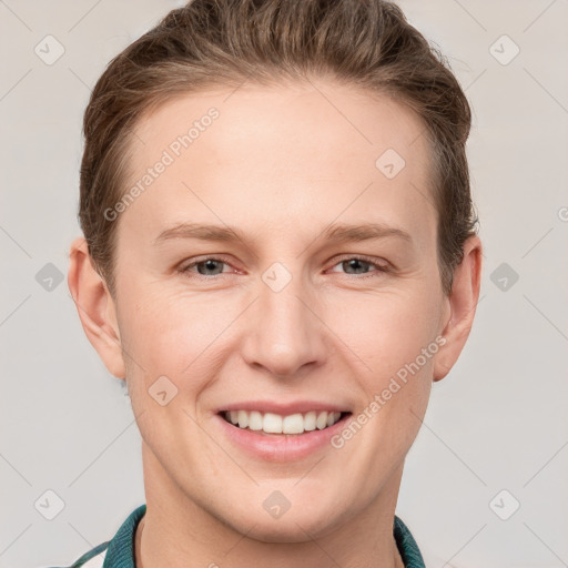 Joyful white adult female with short  brown hair and grey eyes