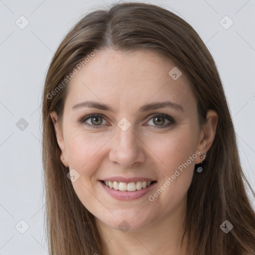 Joyful white young-adult female with long  brown hair and grey eyes