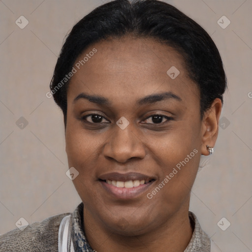 Joyful latino young-adult female with short  black hair and brown eyes