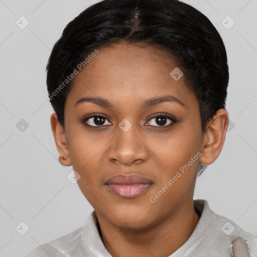 Joyful black young-adult female with short  black hair and brown eyes