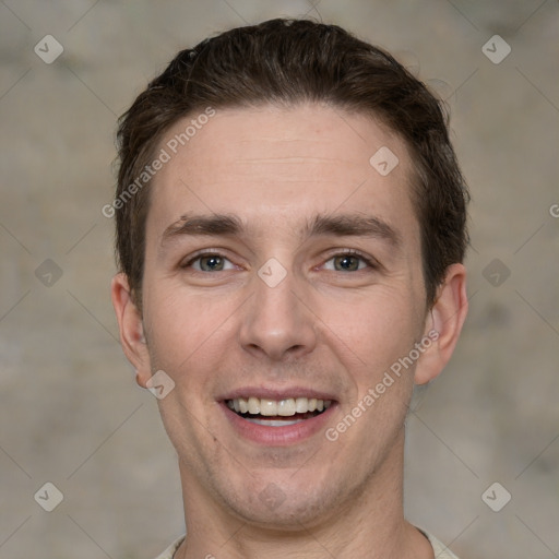 Joyful white adult male with short  brown hair and grey eyes