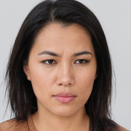 Neutral asian young-adult female with long  brown hair and brown eyes