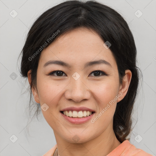 Joyful asian young-adult female with medium  black hair and brown eyes