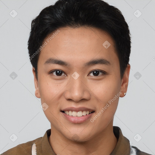 Joyful asian young-adult male with short  brown hair and brown eyes