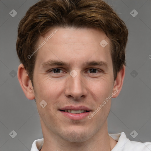 Joyful white adult male with short  brown hair and grey eyes