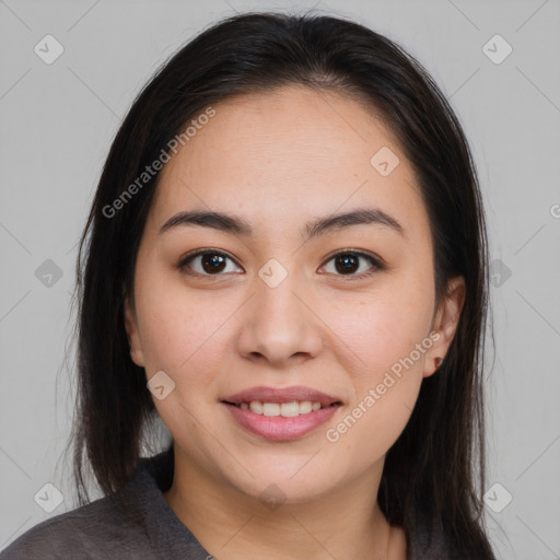 Joyful asian young-adult female with medium  brown hair and brown eyes