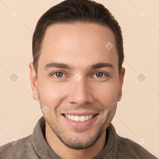 Joyful white young-adult male with short  brown hair and brown eyes