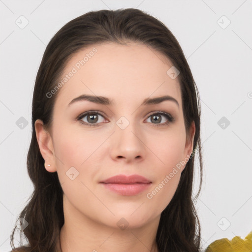 Neutral white young-adult female with long  brown hair and brown eyes