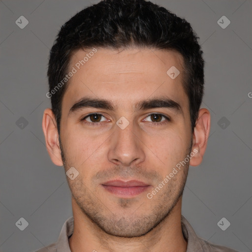 Joyful white young-adult male with short  brown hair and brown eyes