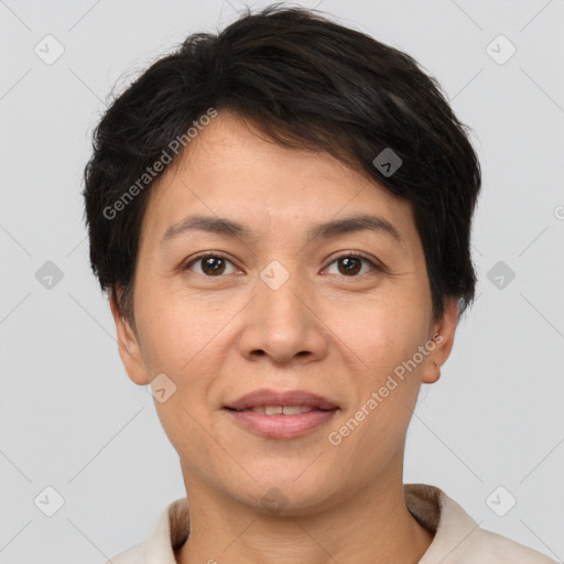 Joyful white adult female with short  brown hair and brown eyes