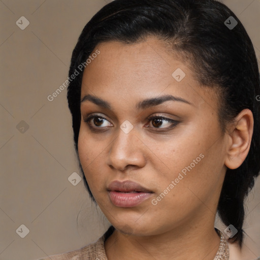 Neutral black young-adult female with medium  black hair and brown eyes