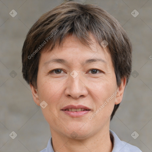 Joyful white adult female with short  brown hair and brown eyes