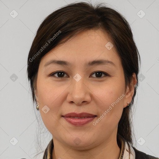 Joyful white adult female with medium  brown hair and brown eyes