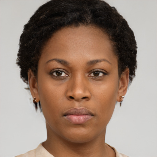Neutral black young-adult female with short  brown hair and brown eyes