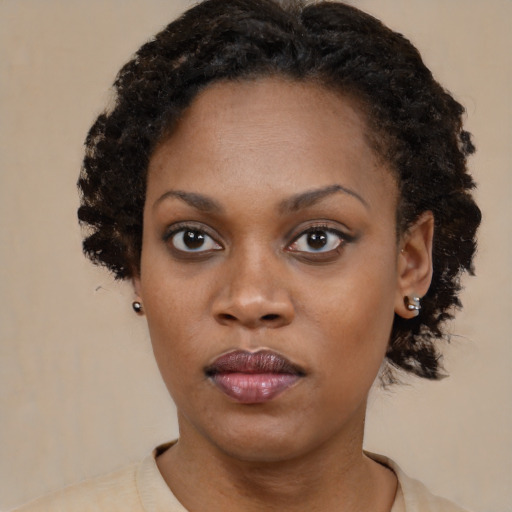 Neutral black young-adult female with short  black hair and brown eyes
