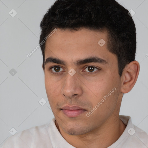 Neutral white young-adult male with short  black hair and brown eyes