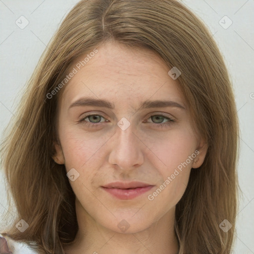 Joyful white young-adult female with long  brown hair and green eyes